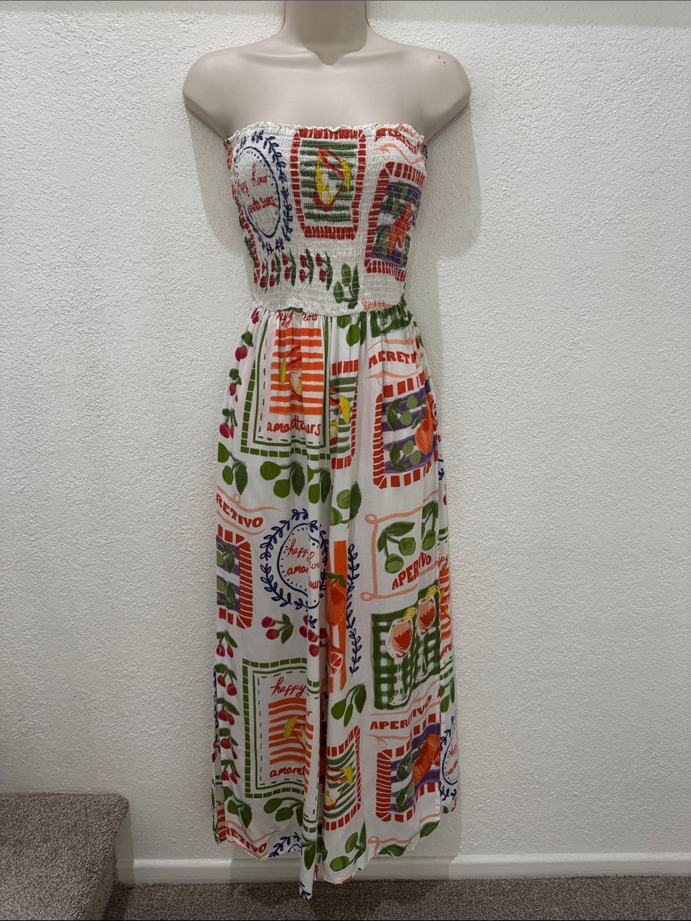CLUB Z COLLECTIOn Strapless White Graphic  Smocked Strapless Jumpsuit EUC